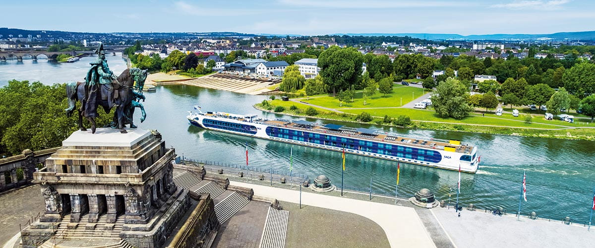 Spirit of the Rhine sailing past Deutches Eck in Koblenz, Germany